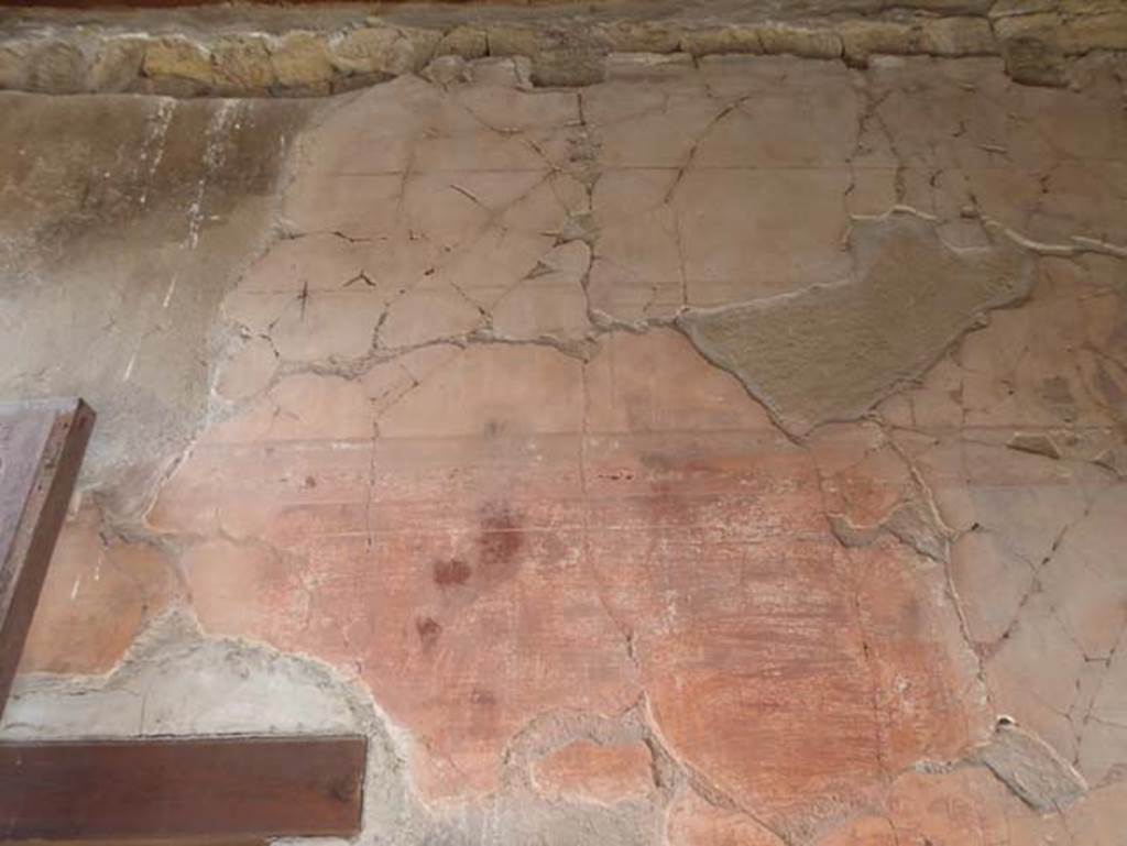 III 16, Herculaneum, October 2014. Room 1, south wall with remains of painted stucco, and doorway to room 2.  Photo courtesy of Michael Binns.